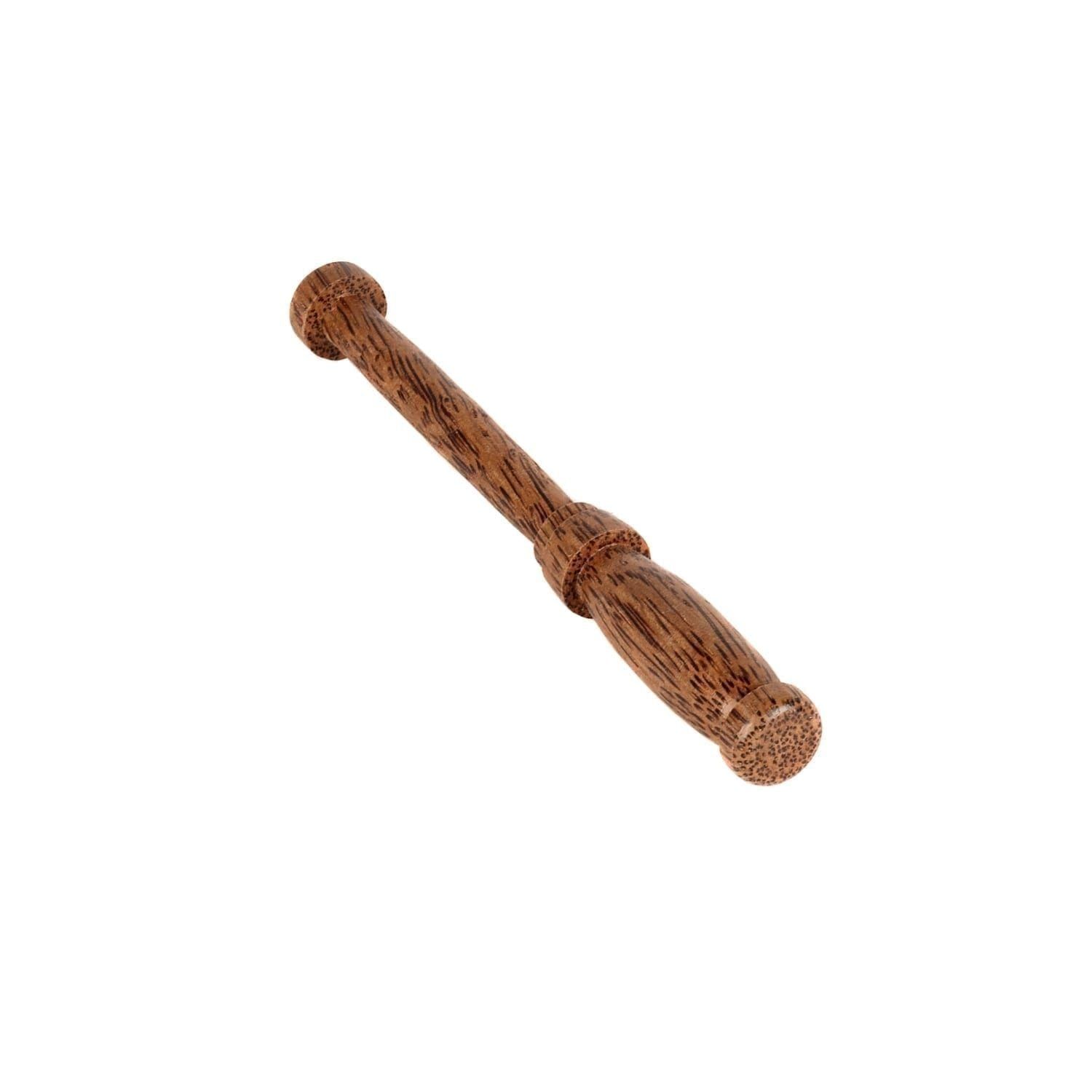This is a product image of the Balinese Drum Beater (Pangul) that comes with each of the Balinese Drum products. It is made of a single piece of solid wood with a thinner handle section and a thicker beater section. This beater is laid flat and pointing down and to the right.